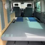 Bed made inside a VW California campervan